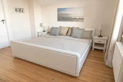 Ein Bett oder Betten in einem Zimmer der Unterkunft Apartment Stadtblick
