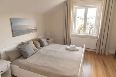Ein Bett oder Betten in einem Zimmer der Unterkunft Apartment Stadtblick