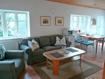 Ein Sitzbereich in der Unterkunft Landhaus-Marwede App 1