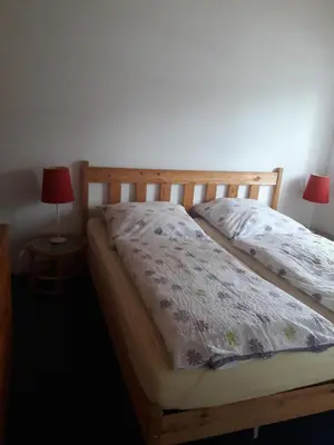 Ein Bett oder Betten in einem Zimmer der Unterkunft Landhaus-Marwede App 1