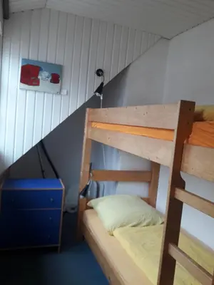 Ein Bett oder Betten in einem Zimmer der Unterkunft Landhaus-Marwede App 1