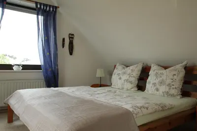Ein Bett oder Betten in einem Zimmer der Unterkunft Ferienwohnung Hamberge
