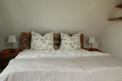 Ein Bett oder Betten in einem Zimmer der Unterkunft Ferienwohnung Hamberge