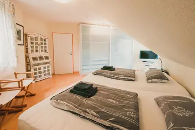 Ein Bett oder Betten in einem Zimmer der Unterkunft Apartment Flair in Uni Nähe