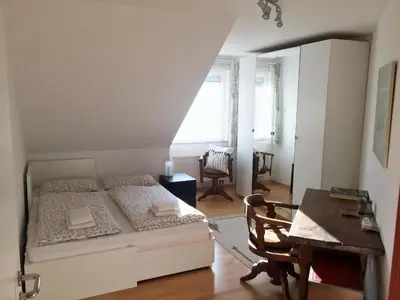 Ein Bett oder Betten in einem Zimmer der Unterkunft Apartment Flair in Uni Nähe