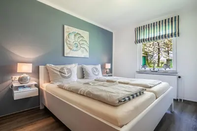 Ein Bett oder Betten in einem Zimmer der Unterkunft Fischereihof Liebe
