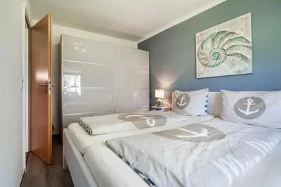 Ein Bett oder Betten in einem Zimmer der Unterkunft Fischereihof Liebe