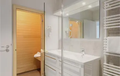 Ein Badezimmer in der Unterkunft Dünenvilla 15, Whg 5