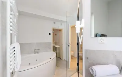 Ein Badezimmer in der Unterkunft Dünenvilla 20, Whg 10