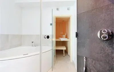Ein Badezimmer in der Unterkunft Dünenvilla 20, Whg 10