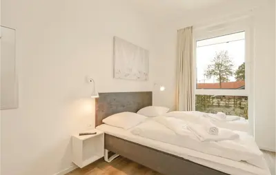 Ein Bett oder Betten in einem Zimmer der Unterkunft Highend Travemünde - Whg 06