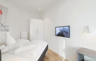 Ein Bett oder Betten in einem Zimmer der Unterkunft Highend Travemünde - Whg 07