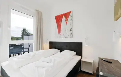 Ein Bett oder Betten in einem Zimmer der Unterkunft Highend Travemünde - Whg 16