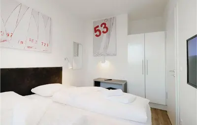 Ein Bett oder Betten in einem Zimmer der Unterkunft Highend Travemünde - Whg 102