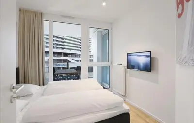 Ein Bett oder Betten in einem Zimmer der Unterkunft Highend Travemünde - Whg 113