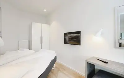 Ein Bett oder Betten in einem Zimmer der Unterkunft Highend Travemünde - Whg 202