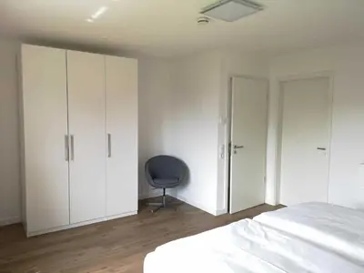 Ein Bett oder Betten in einem Zimmer der Unterkunft Pier 76
