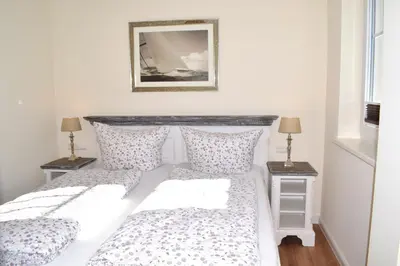 Ein Bett oder Betten in einem Zimmer der Unterkunft Villa Ocean Time