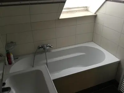 Ein Badezimmer in der Unterkunft Ferienwohnung am Uniklinik