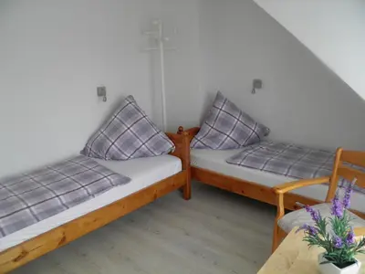 Ein Bett oder Betten in einem Zimmer der Unterkunft Ferienhaus Krabbe 1 Schmiedeberg Timmendorfer Strand Niendorf
