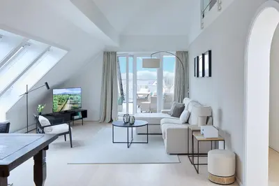 Ein Sitzbereich in der Unterkunft Techts Apartmenthaus