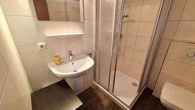 Ein Badezimmer in der Unterkunft PEMATRA Ferienwohnungen Ostseestrasse 2