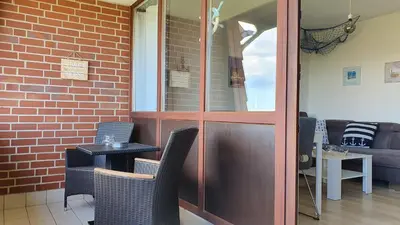 Ein Sitzbereich in der Unterkunft PEMATRA Ferienwohnungen Ostseestrasse 2