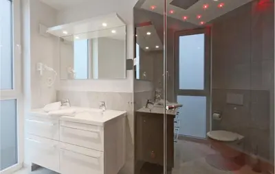 Ein Badezimmer in der Unterkunft Dünenvilla 4, Whg 1