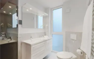 Ein Badezimmer in der Unterkunft Dünenvilla 5, Whg 4