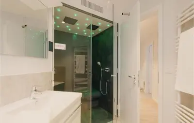 Ein Badezimmer in der Unterkunft Dünenvilla 6, Whg 1