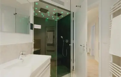 Ein Badezimmer in der Unterkunft Dünenvilla 6, Whg 3