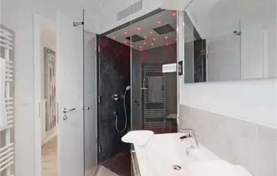 Ein Badezimmer in der Unterkunft Dünenvilla 7, Whg 2
