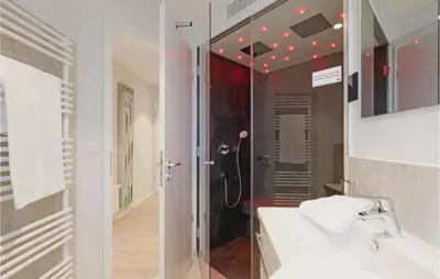 Ein Badezimmer in der Unterkunft Dünenvilla 7, Whg 4