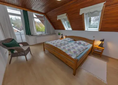 Ein Bett oder Betten in einem Zimmer der Unterkunft Ferienwohnung Walther