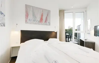 Ein Bett oder Betten in einem Zimmer der Unterkunft Highend Travemünde - Whg 204