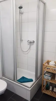 Ein Badezimmer in der Unterkunft PEMATRA Ferienwohnung Fährblick