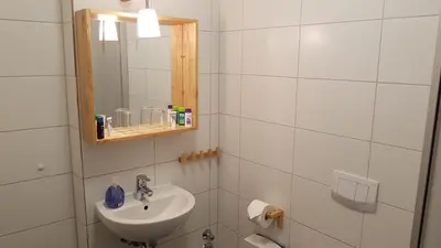 Ein Badezimmer in der Unterkunft PEMATRA Ferienwohnung Fährblick