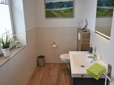 Ein Badezimmer in der Unterkunft Ferienhaus in Groß Schwansee mit Sauna