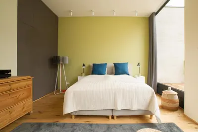 Ein Bett oder Betten in einem Zimmer der Unterkunft An der Mauer 15