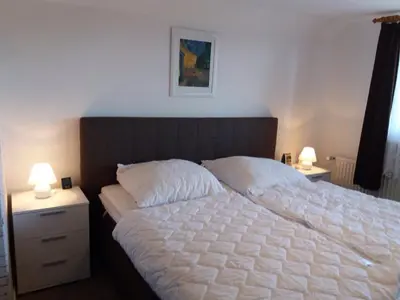 Ein Bett oder Betten in einem Zimmer der Unterkunft Am Bach