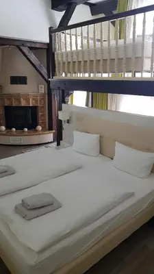 Ein Bett oder Betten in einem Zimmer der Unterkunft Landhotel Klempau