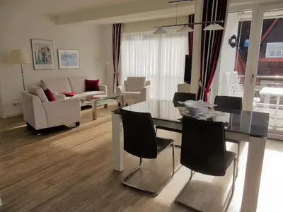 Ein Sitzbereich in der Unterkunft Exklusive familienfreundliche Ferienwohnung im Haus Aalbeek