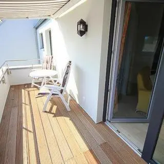 Ein Balkon oder eine Terrasse in der Unterkunft Exklusive familienfreundliche Ferienwohnung im Haus Aalbeek
