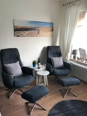 Ein Sitzbereich in der Unterkunft Ferienwohnung Breitengroß