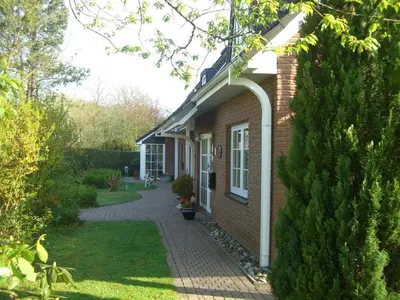 Ein Garten an der Unterkunft Forsthaus Wendt