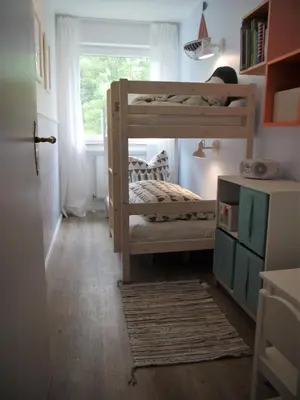 Ein Bett oder Betten in einem Zimmer der Unterkunft Strandperle 6