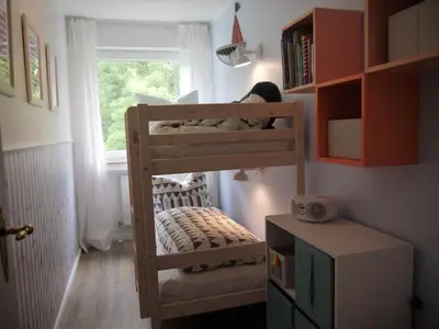 Ein Bett oder Betten in einem Zimmer der Unterkunft Strandperle 6