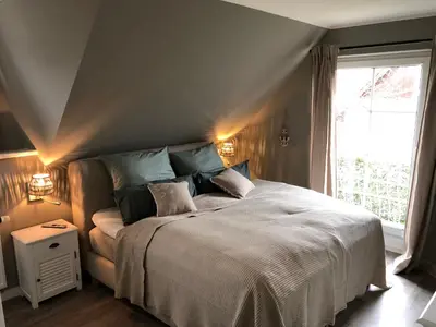 Ein Bett oder Betten in einem Zimmer der Unterkunft Neptun17