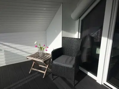 Ein Sitzbereich in der Unterkunft Haus Antje