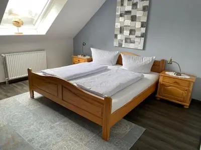Ein Bett oder Betten in einem Zimmer der Unterkunft Haus Antje
